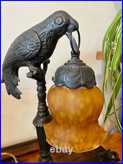 Antique Art Deco Cast Metal Parrot Lamp Holding Amber Art Glass Tulip Shade