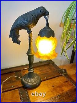 Antique Art Deco Cast Metal Parrot Lamp Holding Amber Art Glass Tulip Shade