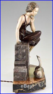 Art Deco figural lamp sculpture lady with swan Uriano France 1930