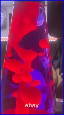 Lava Lamp Grande 27'' pink wax in purple liquid. Absolutely perfect condition