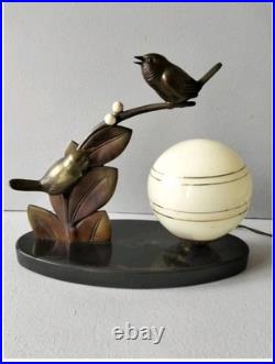 Pretty Art Deco lamp, animal bronze, bird on branch, signed Guy, 1930s