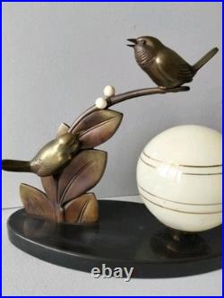 Pretty Art Deco lamp, animal bronze, bird on branch, signed Guy, 1930s