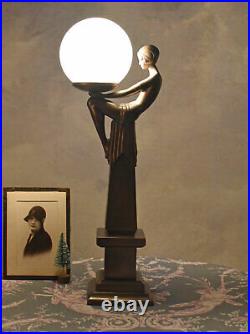 Table lamp woman Art Deco style light crouching dancer round shade milk glass
